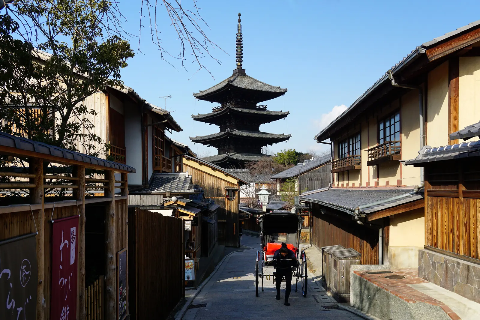 Yasaka Pagoda above a quiet lane of wooden houses in Kyoto
